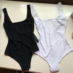 Fashion nova black and white XS body suit